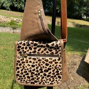 Beautifully crafted leopard leather crossover bag
